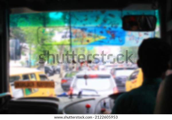 Blurred background. Severe traffic jams\
on super busy streets in Medan City in the\
afternoon