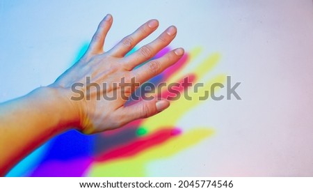 Similar – Foto Bild Frauenhand mit einem darin projizierten Regenbogen