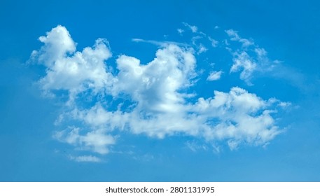 A blurred background of the sky with dissolving translucent haze of clouds or other aerosols formed after the storm. Bottom view with perspective, blank for artwork.