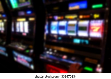 blurred background of slot machines in casino                               - Shutterstock ID 331470134