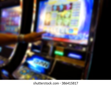 blurred background of slot machines in casino                          - Shutterstock ID 386415817