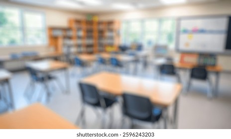 Blurred background of spacious classroom features empty desks ready for students, well-organized bookshelves, and ample natural light, creating an ideal learning environment for education.