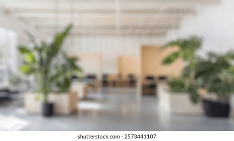 Blurred background of a spacious and inviting office space featuring sleek furniture and abundant greenery, ideal for fostering creativity and productivity in a modern work environment.