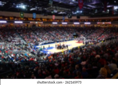 Blurred Background Of Sports Arena Crowd                               