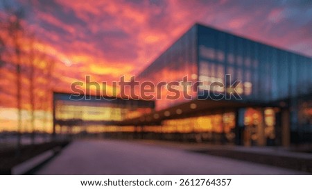 Blurred background of a stunning university library in the netherlands stands out against a vibrant sunset, showcasing modern architecture and serene surroundings, perfect for study and inspiration.