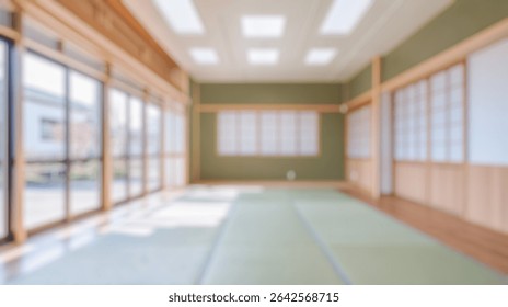 Blurred background of a stylish japanese classroom featuring minimalist design, natural light, and soothing green tones. ideal for primary school educational environments.