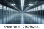 Blurred background of this image showcases a vast empty warehouse interior featuring a polished concrete floor and large windows, creating a bright and airy space perfect for industrial projects.