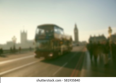 blurred background of traffic on Westminster bridge, famous black cabs and red doubledeckers, London, UK