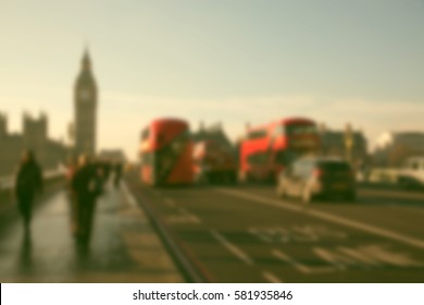 blurred background of traffic on Westminster bridge, famous black cabs and red doubledeckers, London, UK