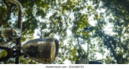 Blurred Background Of Tree Tree Shades With Bicycle Light Clamp