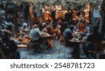 Blurred background of a vibrant outdoor cafe scene on a european street filled with people enjoying food, drinks, and live music in a relaxed yet lively atmosphere.