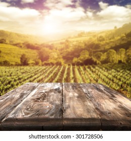 Blurred Background Of Vineyard And Table Top In Sunlight 