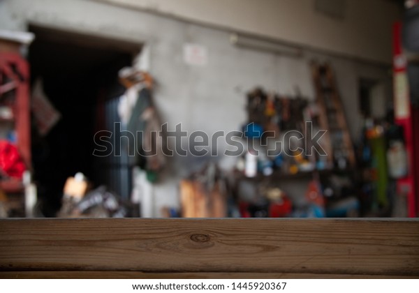 blurred background of a\
workshop for cars
