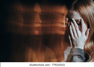 Blurred background and young girl with schizophrenia and mental disorder crying