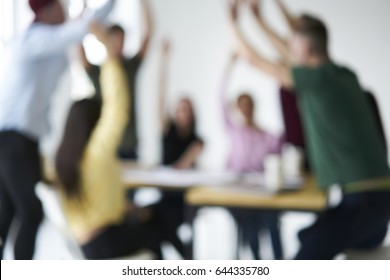 Blurred Background For Your Text Message Or Advertising Promotional Content, Young Happy Team Members Silhouette Celebrating Successful Finishing Of Startup Project In Bright Office High Fiving