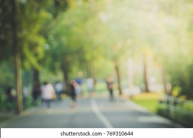 blurred backgrounds of people exercise and running at park outdoor