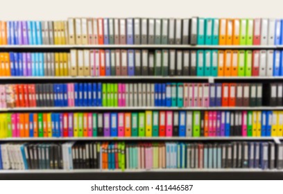 Blurred Binders In Office Supply Store