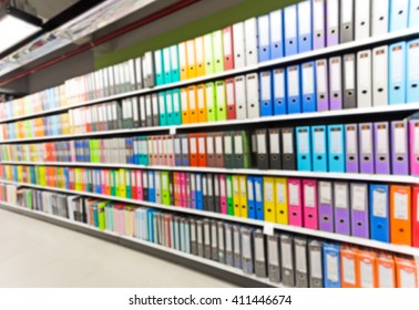 Blurred Binders In Office Supply Store