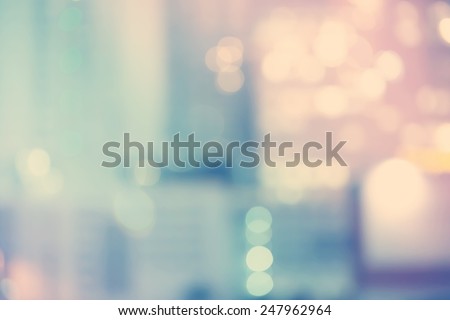Blurred blue and pink urban building background scene 