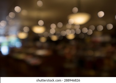 BLURRED AND BOKEH OF LIGHTS AND CHANDELIERS IN LUXURY SUSHI BAR, JAPAN