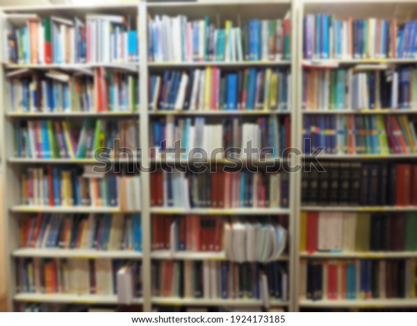 blurred of books\
cabinet library in school\
