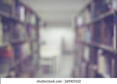 Blurred Books On The Shelf In Public Library. Blurred Effect. Background For Your Pictures