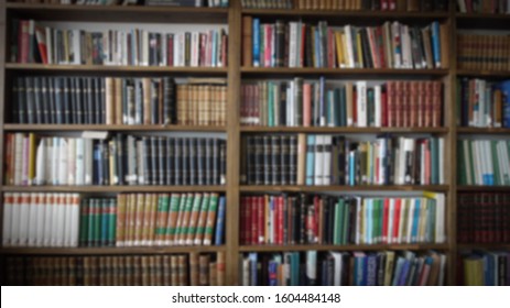 blurred bookshelf Many books in a library background
