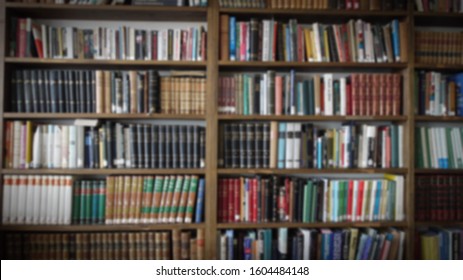 Blurred Bookshelf Many Books In A Library Background