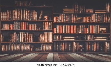 blurred bookshelf Many old books in a book shop or library - Shutterstock ID 1577682832