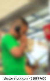 Blurred of boy using phone