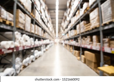 Blurred Brown Goods Boxes On Full Shelves In Warehouse Storage Factory . Perspective Background With Space For Business About Logistics Shipping And Wholesale Concept . 