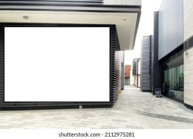 Blurred Business Centre With Very Large Advertising Space Ideal For Marketing Concept, Virtual Communication With Customer. Huge Video Wall Display Mock Up At An Outdoor Location