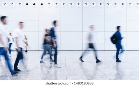 blurred business people crowd at a trade fair - Shutterstock ID 1483180838