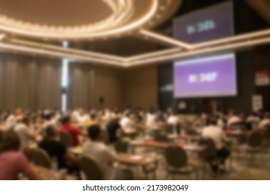 Blurred business people in the hall conference saloon - Shutterstock ID 2173982049
