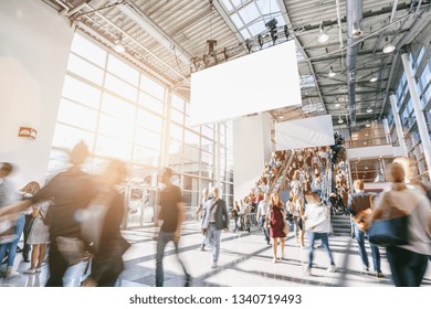 Blurred Business People At A Trade Fair, Including Copy Space