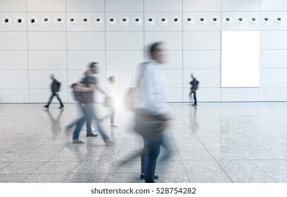 Blurred Business People Walking In A Floor