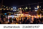 Blurred busy busy fresh market full with crowd people walking in street shopping.
Abstract blur Thailand street food outdoor garden party.