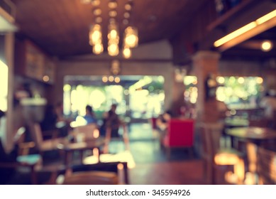 Blurred Cafe Background ,Coffee Shop Blur Background With Bokeh. Vintage Filter Effect