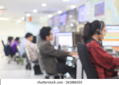 Blurred Call Center Of Network Operator Work Monitoring On Computer At Office Room.