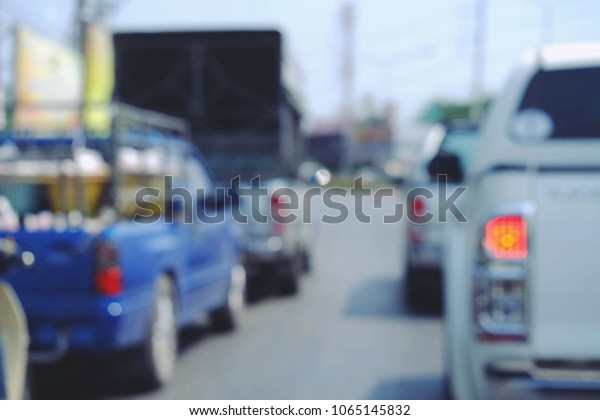 blurred\
car on street wallpaper background, traffic\
jam