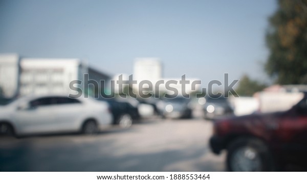 blurred car parking background. outdoor car\
parking in the department\
store.