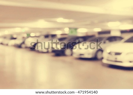 blurred of car in parking lot.