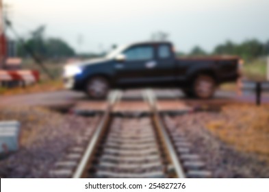 Blurred Car Railroad Crossing