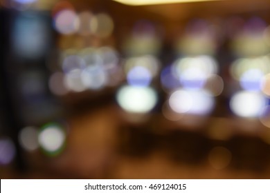 Blurred Casino Slot Machines On Gambling Floor