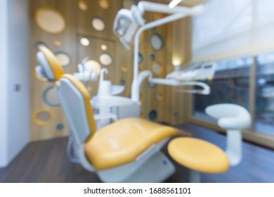 Blurred Chair For Children In Dentistry Room, Modern Equipped Room, No People, Copy Space