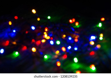 Blurred Christmas lights festive background.