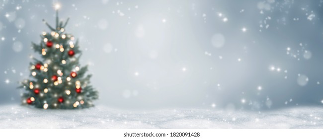 blurred christmas tree   christmas  lights abstract snowy landscape background  xmas background concept and advertising space