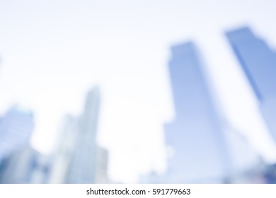 BLURRED CITY BACKGROUND, COMMERCIAL BUILDINGS, SKYSCRAPERS AND BLUE SKY