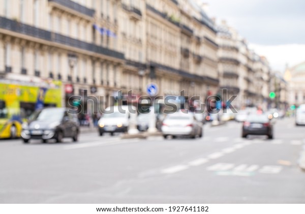 blurred city street on day\
noon light
