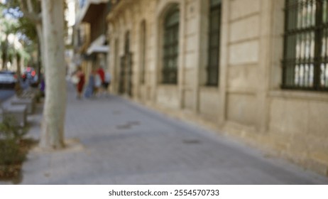 Blurred city street scene with people walking near historic building on a sunny day, featuring bokeh effect and defocused background. - Powered by Shutterstock